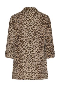 Chemise à imprimé léopard, dotée d'un col, de manches retroussées et d'une coupe décontractée. Confectionnée dans un tissu doux avec des tons marron et beige dans un motif tacheté.