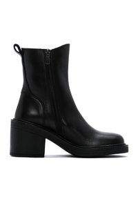 Black leather ankle boot with a rounded toe, prominent side zipper, and a chunky heel. Smooth texture with minimal detailing.