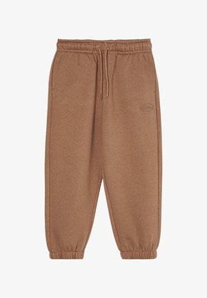 Braune elastische Sweatpants mit Bund und Bündchen, Kordelzug und dezentem Logo am oberen linken Oberschenkel.