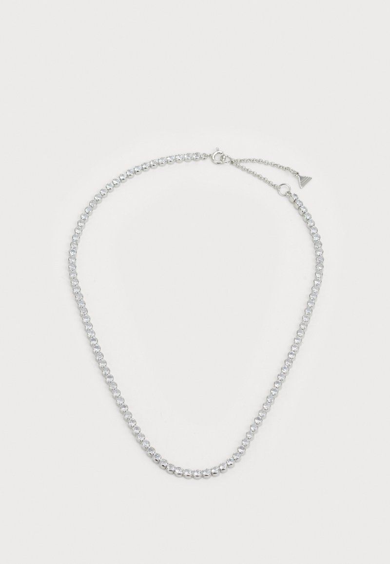 Sølv halskæde med en kæde af runde krystaller, der reflekterer lys, med en sikker lukning og justerbar led for størrelsevariation.