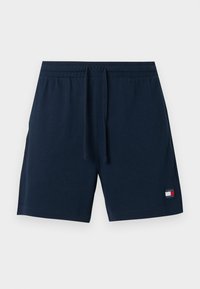 Σκούρο μπλε αθλητικό σορτς κατασκευασμένο από υλικό με υφή, με ελαστική ζώνη μέσης και κορδόνι ρυθμιζόμενο, καθώς και λογότυπο στο τελείωμα.