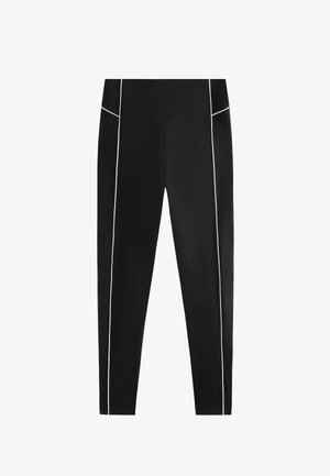 Fekete leggings rugalmas anyagból, fehér oldalsó díszítéssel. Magas derék a kényelemérdekében és karcsú, testhez simuló sziluett.