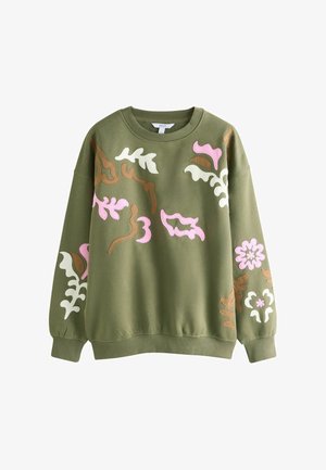 Olivgrünes Sweatshirt mit floraler Applikation in Rosa, Weiß und Braun auf der Vorderseite. Gerippter Ausschnitt und Bündchen, lockere Passform.