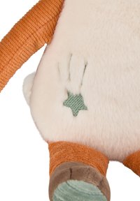 Plush toy with soft white fur, orange corduroy arms, brown and green accents. Features a green embroidered star and paw print detail.