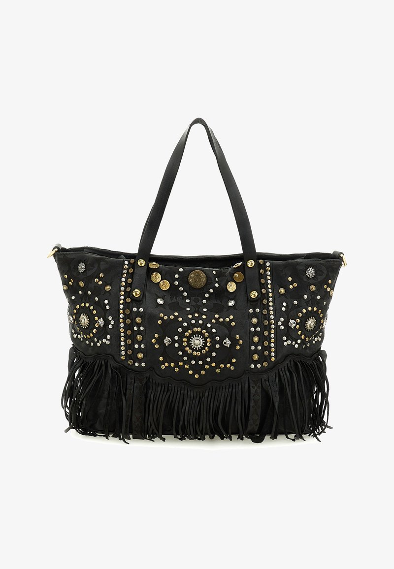 Borsa tote nera con borchie dorate e argentate disposte in motivi circolari, manici in pelle e frange lunghe lungo il bordo inferiore.