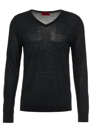 Stickad tröja - black