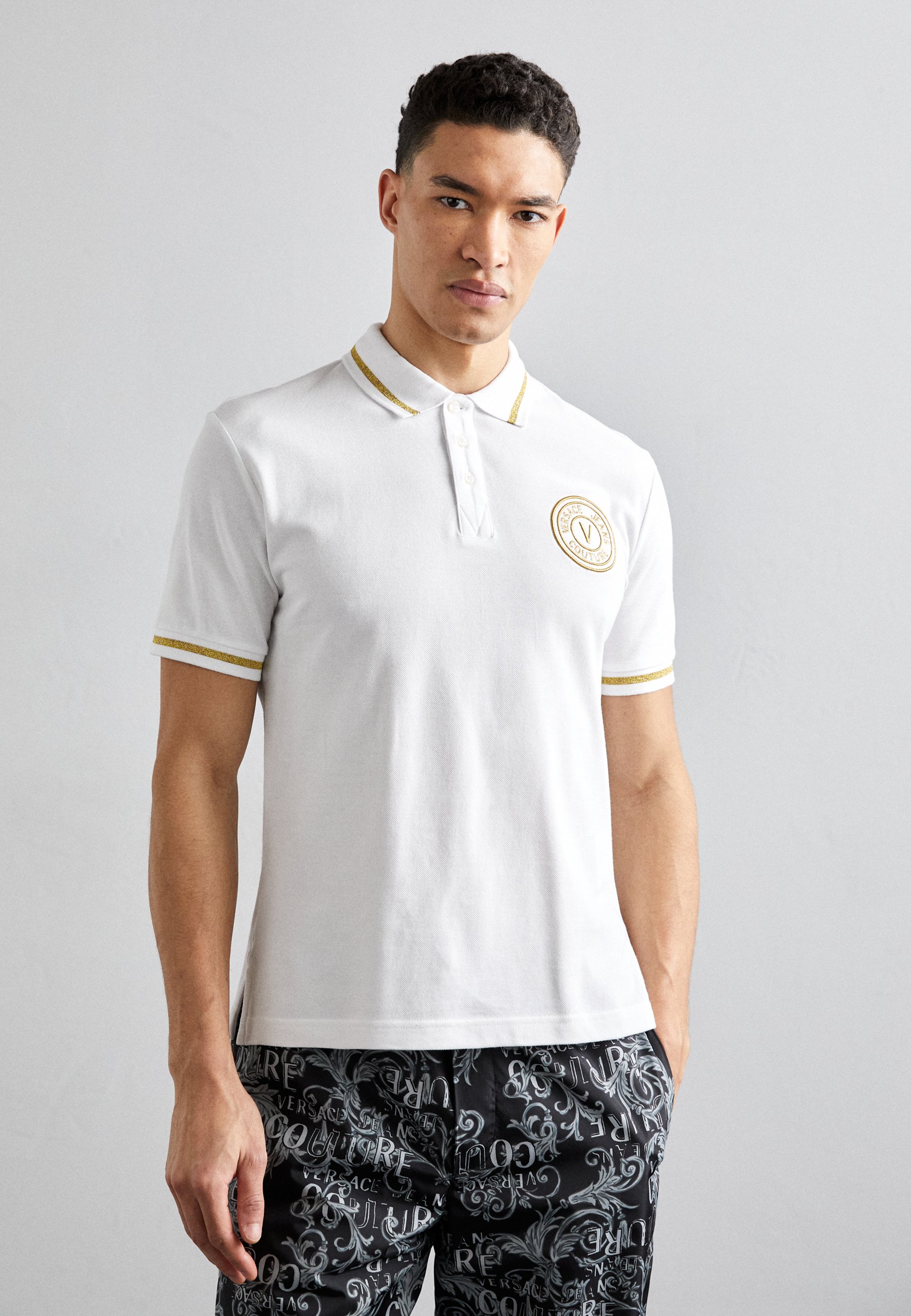 white gold polo shirt