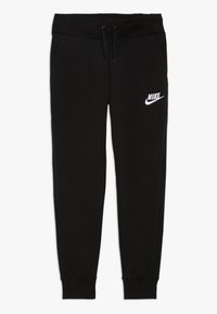 Svarta Nike sweatpants med dragsko i midjan, avsmalnande ben, sidofickor och en vit Nike-logga på vänster lår. Slät tygtextur.