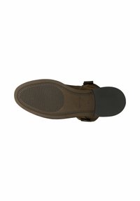 Bruine leren sandaalzool met een gestructureerde rubberen grip. Beschikt over een gevormde contour en verstelbare gesp-accenten aan de zijkant.