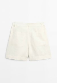 White high-waist shorts with back belt loops and two square patch pockets on a plain background.