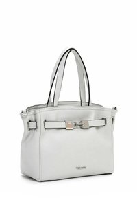 White leather handbag with black accents, short handles, silver hardware, and a rectangular shape. Features a locking mechanism on the front.