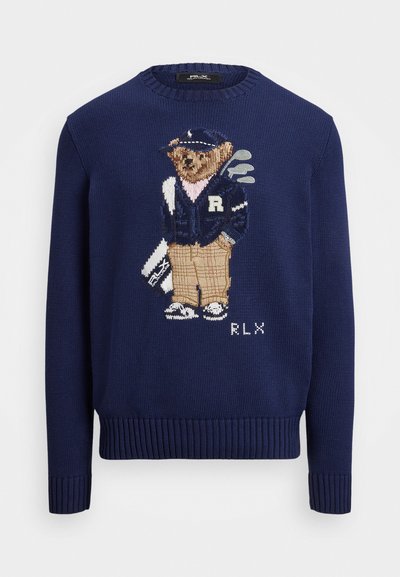 Maglione a maglia blu navy con un orso ricamato in abbigliamento da golf, dotato di un logo sul petto e bordi a costine sulle maniche e sull'orlo.