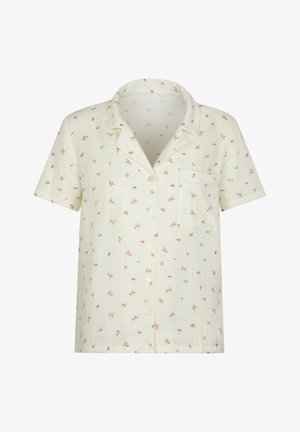 Cremefarbenes kurzärmeliges Hemd zum Zumachen mit kleinem rosafarbenem Blumenmuster und einer Brusttasche.