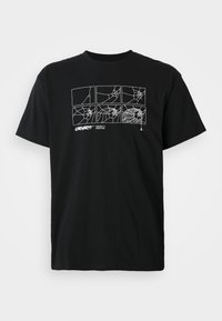 T-shirt en coton noir avec un motif de toiles d'araignées en dessin linéaire blanc sur la poitrine. Manches courtes et col rond.
