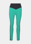 WOMEN'S LEGGINGS - Leggingek - green