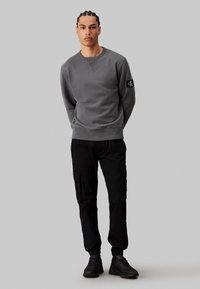 Calvin Klein Jeans WASHED - Kapsáče - ck black