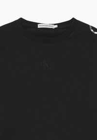 Calvin Klein Jeans FOIL LOGO BOXY - Top s dlouhým rukávem - black