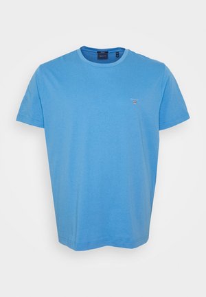 Solid lys blå kortærmet bomuld T-shirt med rund halsudskæring og lille GANT-logo på venstre bryst.
