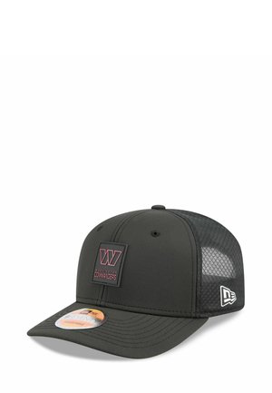Black cap with a curved brim, featuring a mesh back, rubberized logo patch in red and black, and adjustable snapback closure.