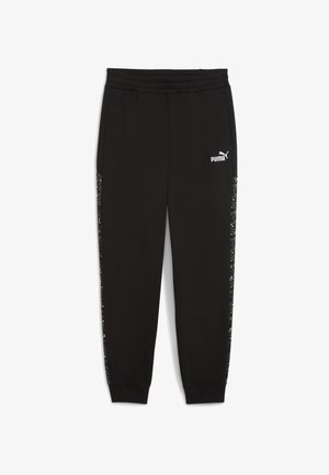 Calças de treino pretas feitas de um tecido suave, com uma cintura elástica larga e painéis laterais brilhantes com padrão de lantejoulas. Logo da Puma na parte da frente.