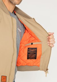 Bombers IWAKI UNISEX taupe