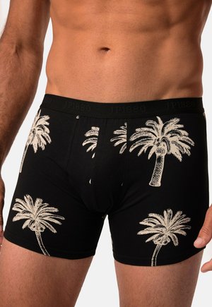 Schwarze Boxershorts mit weißen Palmenmotiven. Weiches Baumwollmaterial, enganliegend und mit einem elastischen Bund mit "JP1880"-Markenlogo.