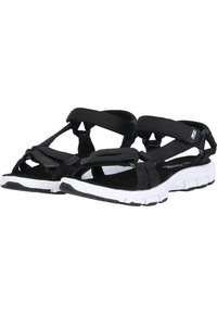 Black sandals with adjustable straps, soft fabric upper, and a white rubber sole featuring grooves for traction and flexibility.