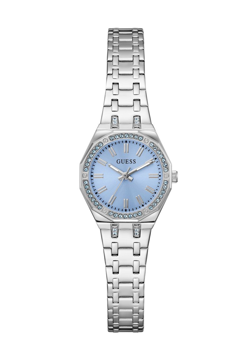 Montre-bracelet Guess en métal argenté avec un cadran bleu, des chiffres romains argentés et des accents en cristal autour de la lunette et sur les maillons du bracelet.