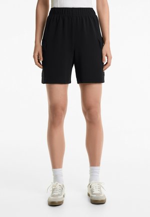 SOFT TOUCH WITH POCKETS - Tracksuit bottoms - black