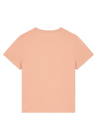 T-shirt met korte mouwen, zachte perzikkleur, ronde hals, eenvoudig ontwerp, gladde textuur, zonder grafische afbeeldingen, standaard pasvorm.