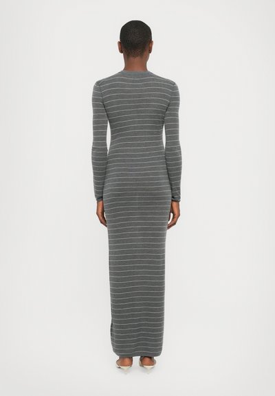 Gray long-sleeve maxi dress with horizontal white stripes, fitted shape, soft fabric texture, and subtle detailing at the neckline.