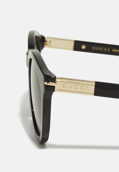 Gucci Päikeseprillid - black/grey