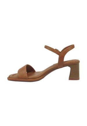 Brown leather open-toe sandal with low stacked block heel and adjustable ankle strap with buckle closure.