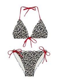 Svartvitt bikini med lövmönster och röda knytband; trekantsöverdel och sida-knuten underdel; vågiga kanter. Tillverkad av lätt material.
