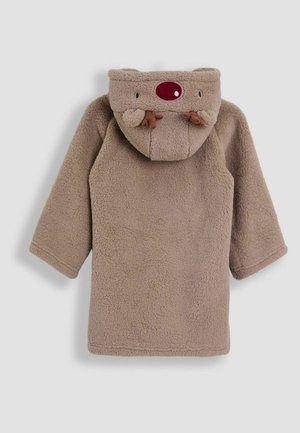 Manteau en polaire marron avec une capuche, orné d'un nez rouge et de petites cornes, conçu pour la chaleur et le confort. Texture douce et coupe décontractée.