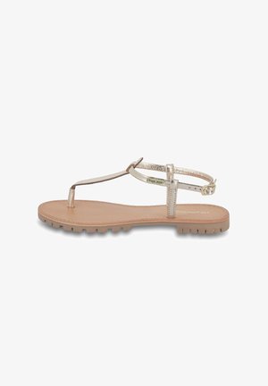 Flat sandal with a metallic gold thong strap, beige footbed, and textured rubber sole. Adjustable buckle for a secure fit.