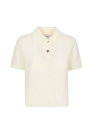 Polo a maniche corte di colore crema, realizzato in maglia, con colletto classico e patta a tre bottoni. Tessuto morbido con una vestibilità rilassata.
