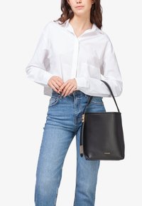 Miriade Borsa a mano - nero