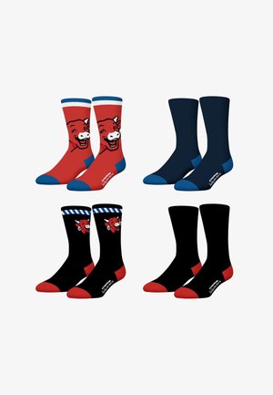 Quatre paires de chaussettes : rouges avec un graphisme de vache et des accents bleus, bleu marine, noires avec un graphisme de vache et un haut rayé, et noires unies.