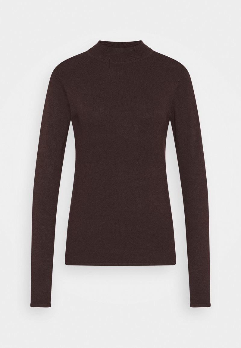 Tummanruskea pitkähihaisen istuva neule, jossa on puolikorkea kaulus, valmistettu hienosta neuletikankaasta vaaleaa taustaa vasten.