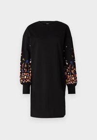 Svart sweatshirtklänning med långa, voluminösa ärmar som har färgglad blommönsterbroderi. Tillverkad av mjukt tyg, med ribbade manschetter vid handlederna.