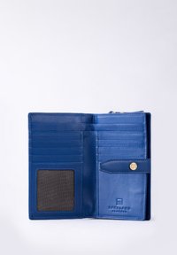 Blue leather wallet with multiple card slots, a transparent ID pocket, and a snap button closure. Features embossed logo. Smooth texture.