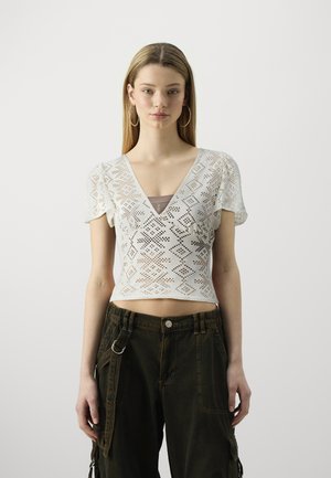 ONLTILDA - T-shirt con stampa - cloud dancer