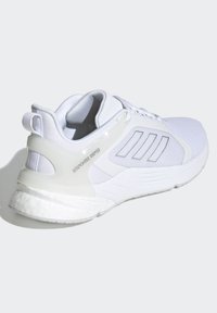 White athletic shoe featuring a mesh upper, smooth synthetic accents, three side stripes, and a Boost midsole for cushioning.