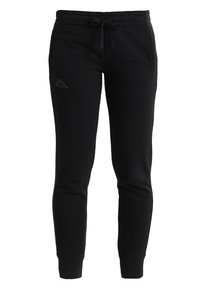 Černé tepláky s elastickým pasem a šňůrkou, s malým logem Kappa na levé straně, zobrazené na jednoduchém pozadí.