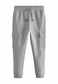 Pantaloni della tuta grigi realizzati con un materiale morbido. Presentano un elastico in vita con cordoncino, tasche laterali e polsini a coste sulle caviglie.