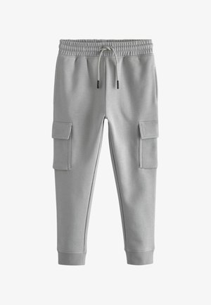 Pantaloni de trening gri dintr-un material moale. Au un talie elastică cu șnur, buzunare laterale și mansete cu nervuri la glezne.