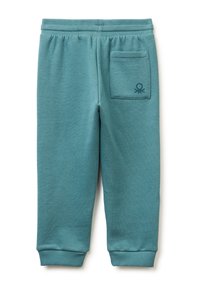 Turkusowe dresy z elastycznym pasem, ściągaczami u dołu i tylną kieszenią z logo. Miękka, teksturowana tkanina.