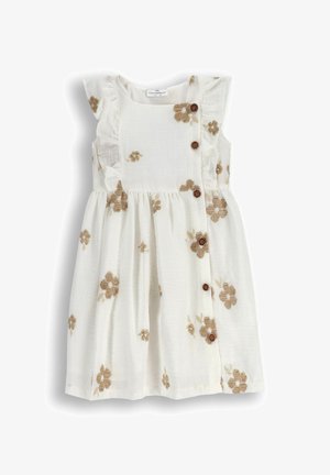 Biała sukienka z brązowymi haftami w kwiaty, falbaniastymi rękawami i trzema drewnianymi guzikami z przodu, uszyta z lekkiego materiału.