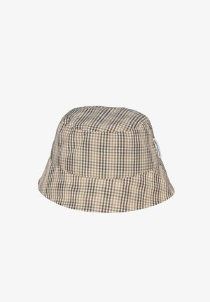 Beżowo-brązowy kapelusz typu bucket z miękkiego materiału z małą białą metką po boku.